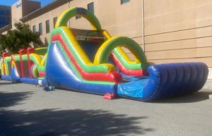 inflatable deluxe obstacle course jumper with slide